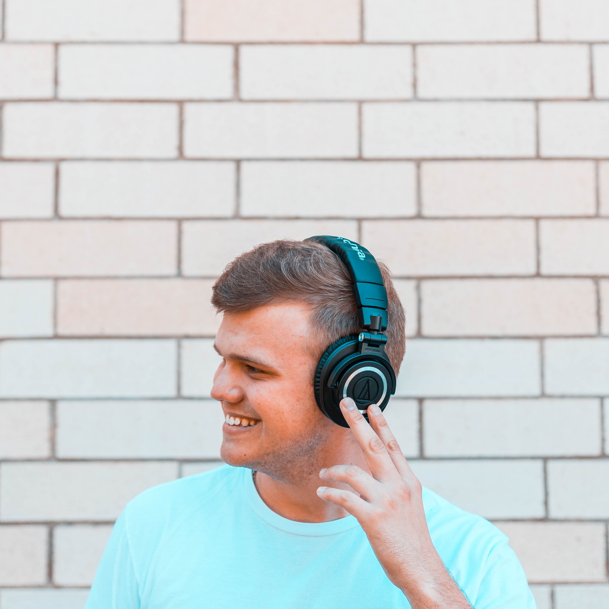A young man listening to music