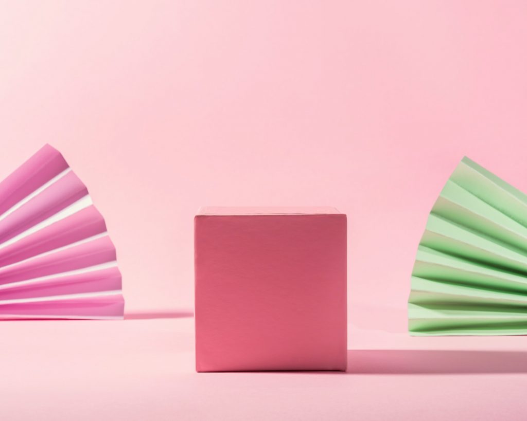 Geometric pink stand podium for product display with shadows